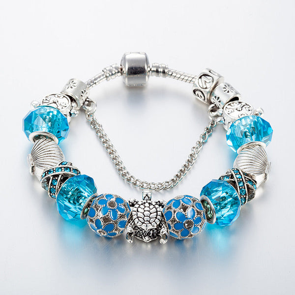 Blue Glass Sea Turtles Charm Bracelet