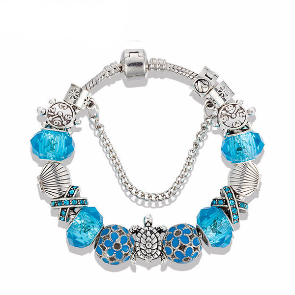 Blue Glass Sea Turtles Charm Bracelet