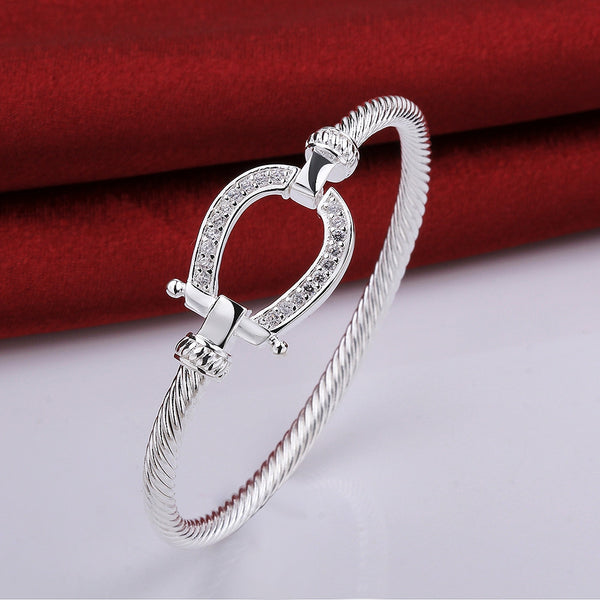 18K white gold plated horseshoe bangle
