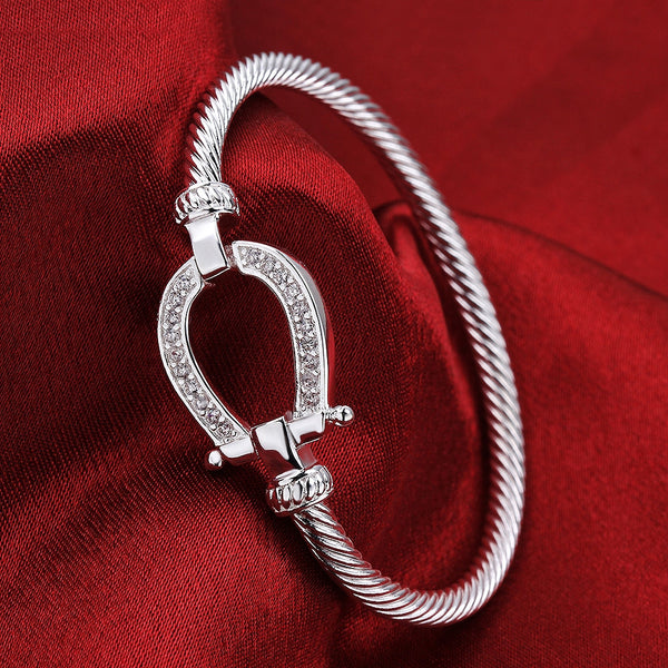 18K white gold plated horseshoe bangle